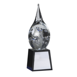 Glasdroppe på träsockel